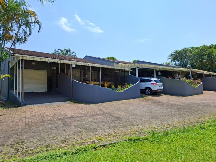 Uvongo Townhouse For Sale: 2 Bedrooms, gated community, pet-friendly, garage access.