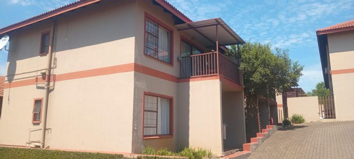 Top-Floor Apartment For Sale in Pioneer Park with Pool and Private Balcony.