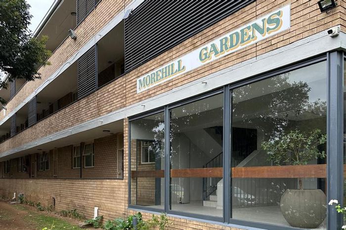 For Sale: Apartment in Morehill with balcony, communal gardens, and secure parking.