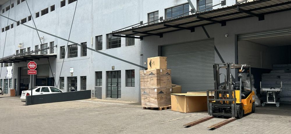 Outside with Roller Shutter And Reception Door