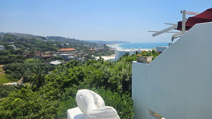 Coastal apartment in Shakas Rock with beach access, pool, and spacious balcony. For Sale.