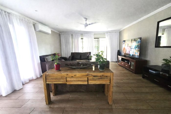 Arboretum Townhouse For Sale: 3 beds, patio, braai, pond view, pet-friendly.