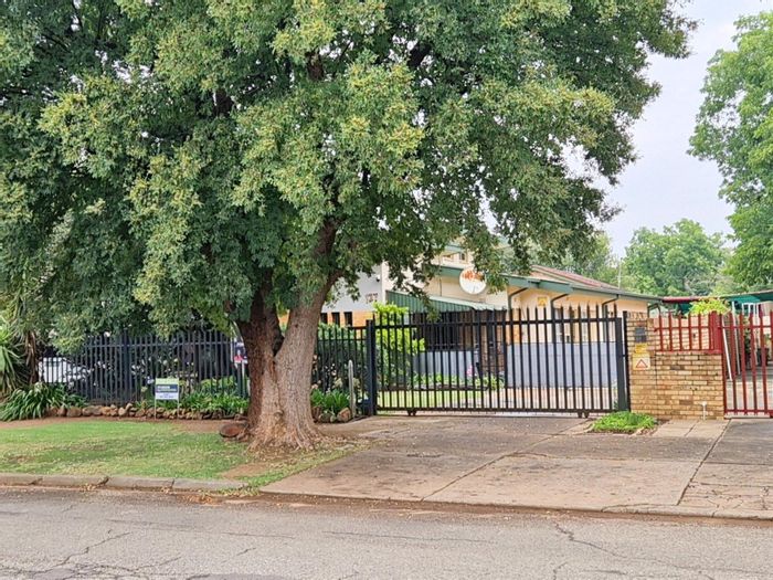 For Sale: Spacious Potchefstroom Central house with pool, flatlets, and large garden.