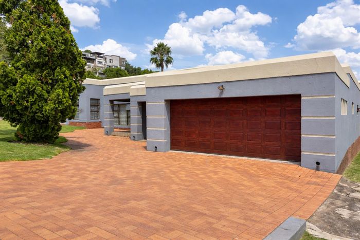 For Sale: Spacious Oakdene house with garden, staff accommodation, and four-car garage.