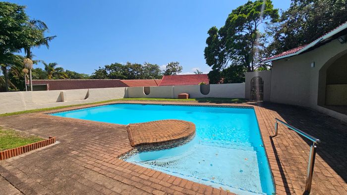 For Sale: 3-Bedroom Townhouse in Margate Central with pool, garden, and double garage.