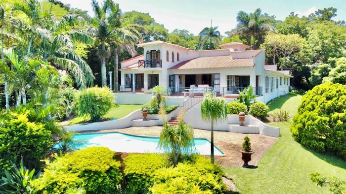 House for Sale in Umtentweni: Sea views, pool, entertainment area, and spacious garden.