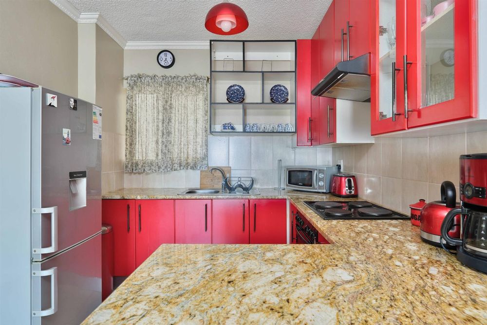 Fitted kitchen with granite tops