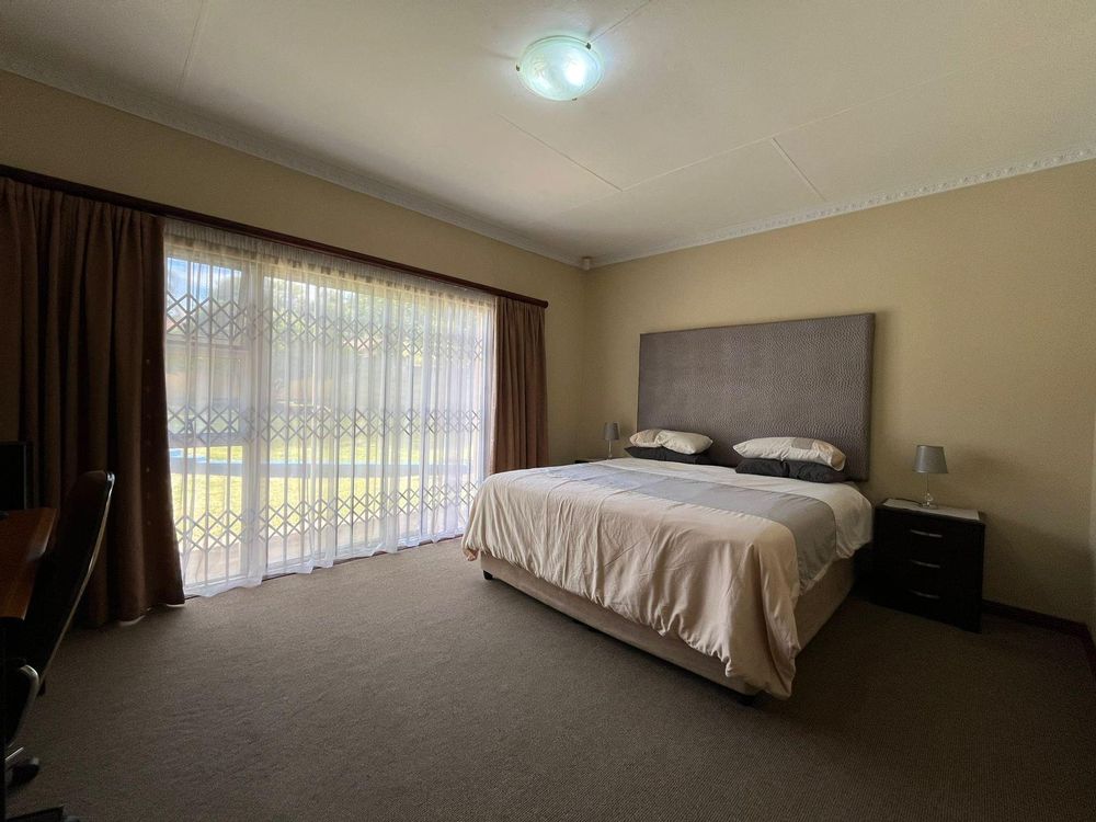 Main bedroom with carpets