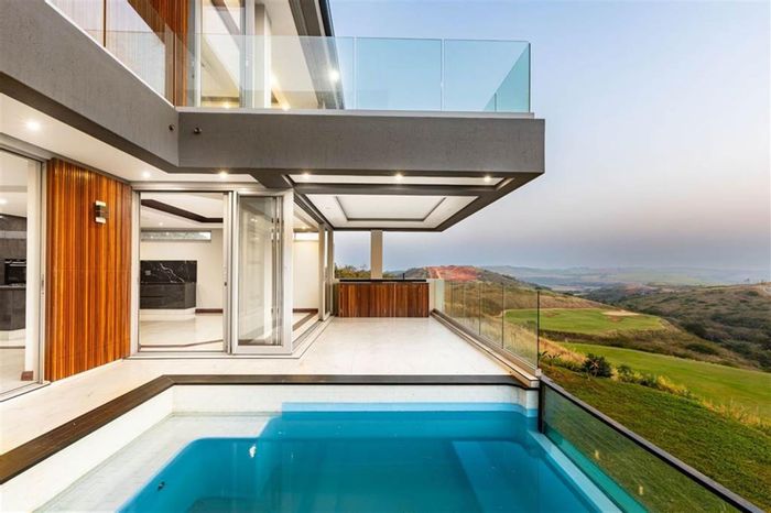 For Sale: House in Zimbali Lakes Resort with golf views, pool, and amenities.