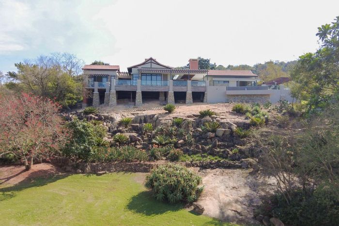 For Sale: House in Sheffield Ridge with pool, jacuzzi, solar power, and servants quarters.