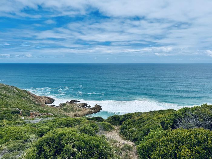 Vacant Land Residential For Sale in Paradise Coast with Ocean Views and Building Options.