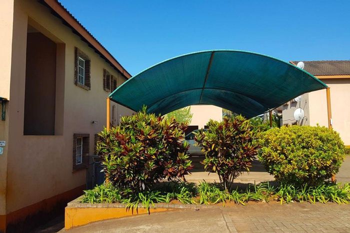 Aquapark Townhouse For Sale: 2 Bedrooms, Balcony, Secure Living, Close to Amenities.