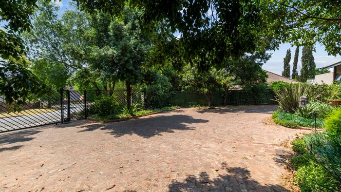 For Sale: Spacious Mondeor House with 6 Bedrooms, Flatlet, Garden, and Security.