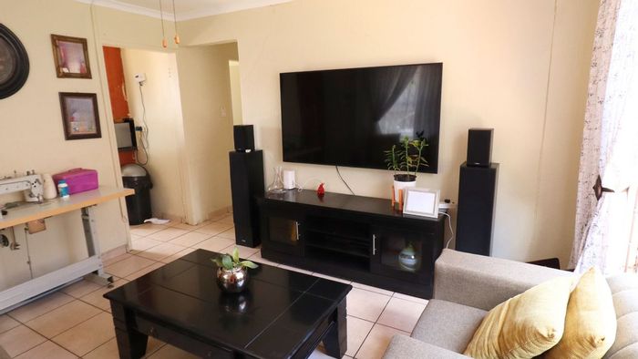 For Sale: House in Lotus Gardens with 3 bedrooms, garden, and double carport.