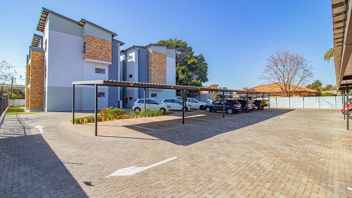 Lyttelton Manor Apartment For Sale: Open plan living, balcony, secure parking, low levies.
