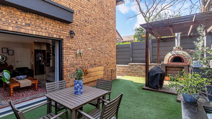 Robindale Townhouse For Sale: 3 bedrooms, private garden, braai area, double garage.