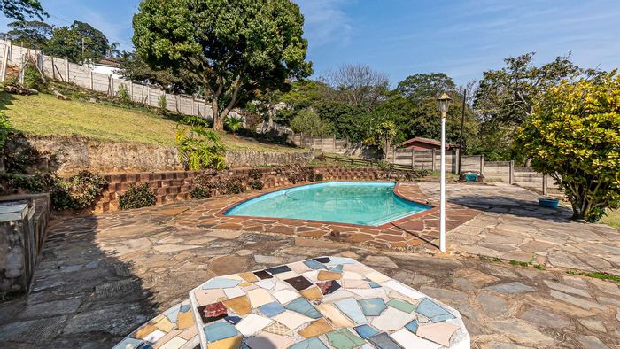 Spacious Amanzimtoti Central house with pool, double garage, and close to schools. For Sale.