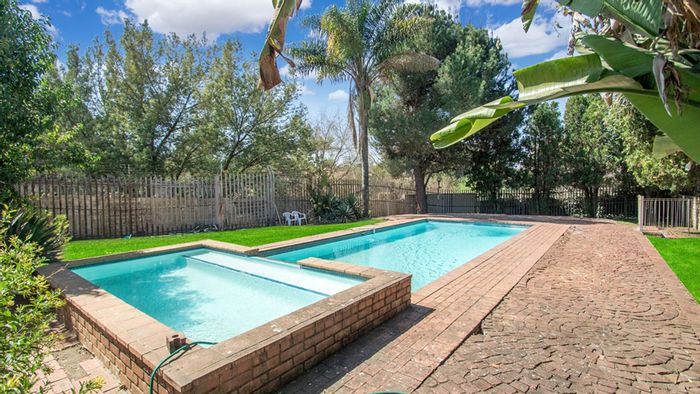 For Sale: Weltevreden Park Apartment with 2 beds, pool, and secure parking.