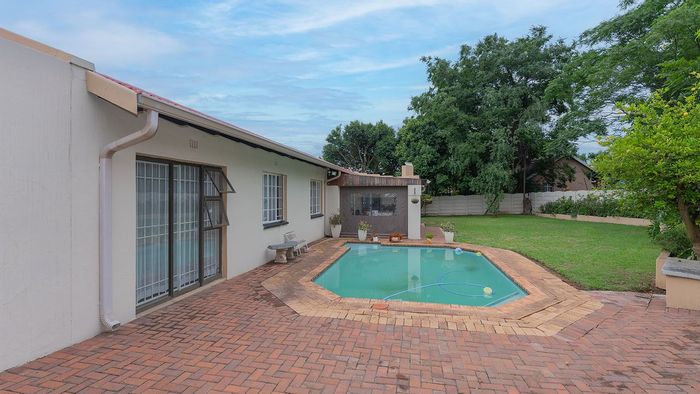 Inviting Four-Bedroom House for Sale in Van Riebeeck Park Oasis