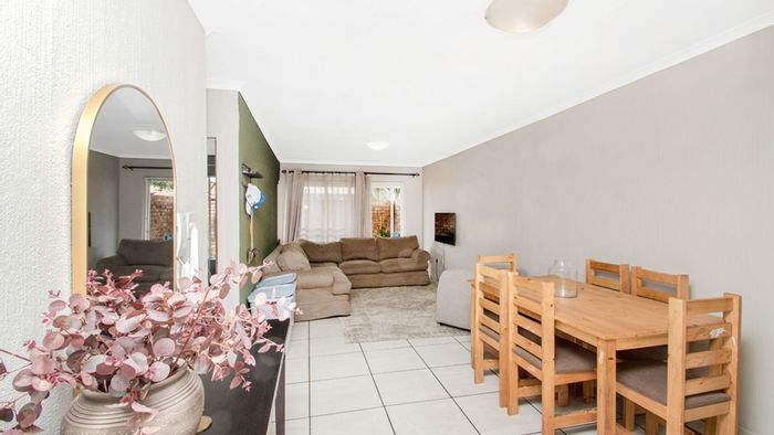 For Sale: Townhouse in Roodekrans with garden, pool, and garage amenities.