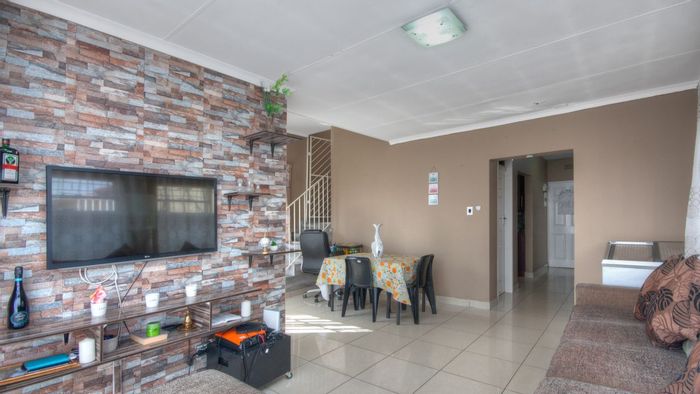 Lenasia Double Story Gem: 3 bed, 2 bath, modern interiors, double garage, ample parking.