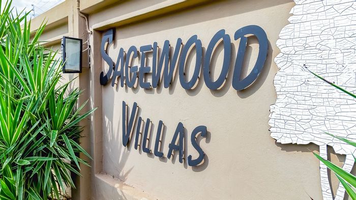 3-Bedroom Townhouse in Annlin For Sale with Garage, Carport, and Private Patio.