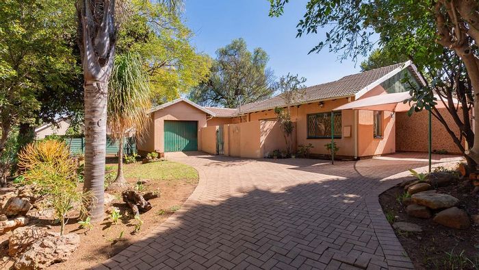 House For Sale in Highway Gardens: Park views, spacious garden, secure living.