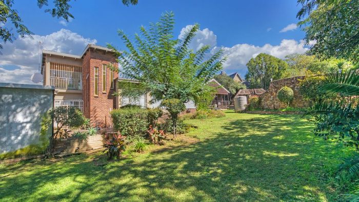 Spacious Mondeor house with pool, flatlet, and expansive garden for sale.