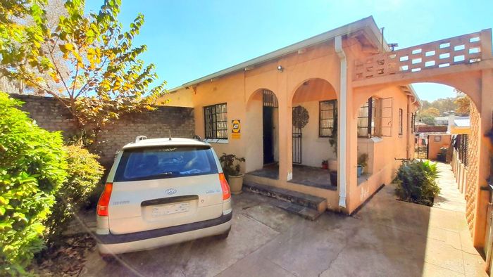 House for Sale in Bezuidenhout Valley: 2 beds, parking, rental potential, near amenities.