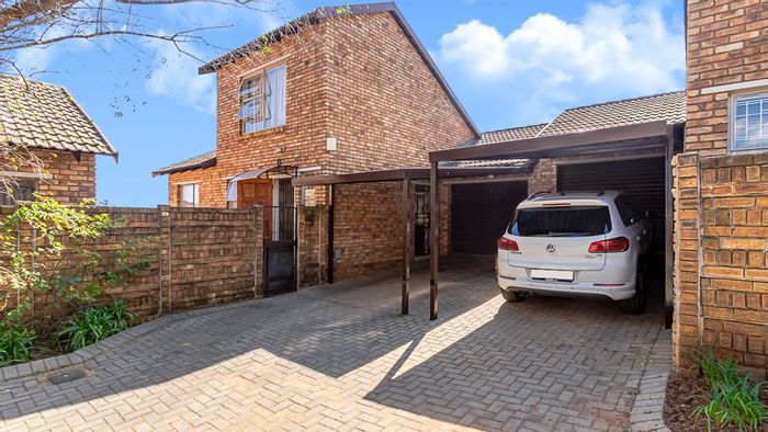 For Sale: Townhouse in Allen's Nek with garden, garage, and versatile loft space.