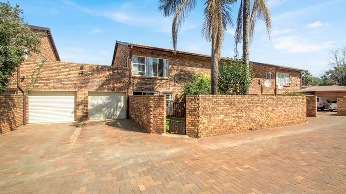 For Sale: 3-Bedroom Townhouse in Roodekrans with garden, garage, and fiber-ready amenities.