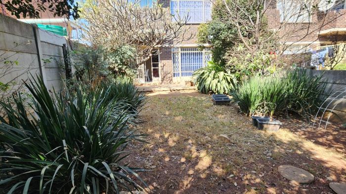 For Sale: Croydon Apartment with private garden, secure parking, and open-plan living.