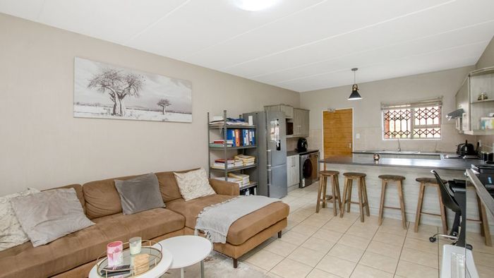For Sale: Wilgeheuwel Apartment with 2 Bedrooms, Balcony, and Open Plan Living.