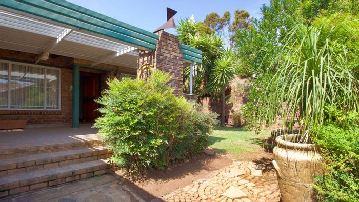 Highveld House For Sale: Family home with double garage, entertainment area, and study.