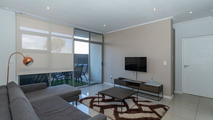 Ground Floor Apartment For Sale in Bedfordview Central with pool, security, and parking.