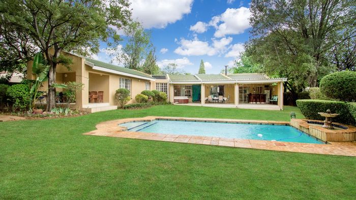 For Sale: Douglasdale House with pool, garden, jacuzzi, and double garages.