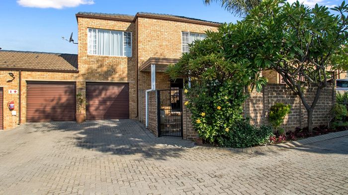 Honeydew Manor Townhouse For Sale: Open-plan living, private garden, double garages.