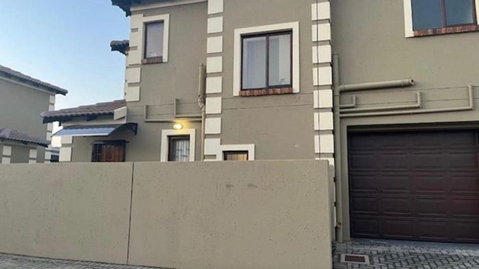 For Sale: Montana Townhouse with 3 bedrooms, double garage, and security estate.