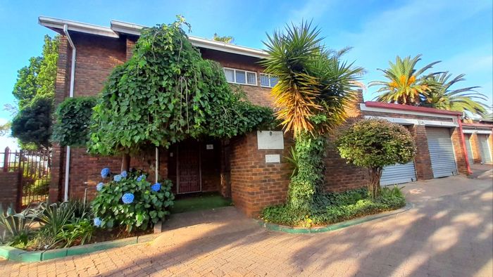 For Sale: Townhouse in Clayville East with garage, carport, and ample parking.