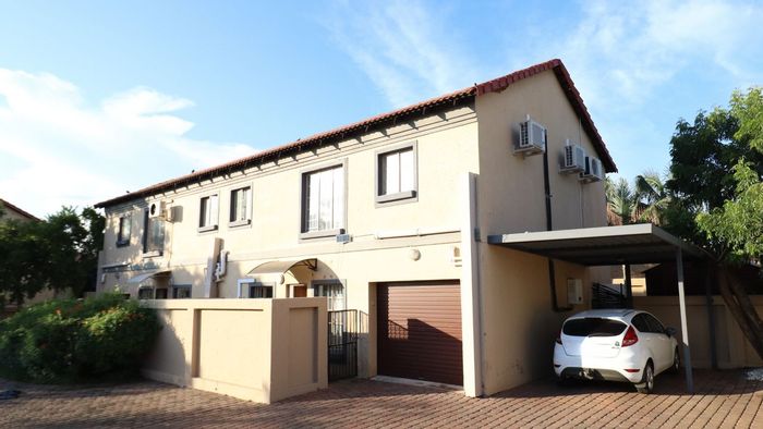 3-Bedroom Townhouse in Annlin with off-grid features and private backyard. For Sale.