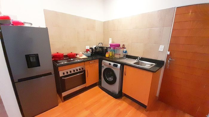 For Sale: 1-bedroom apartment in Marshalltown with balcony, parking, near schools.