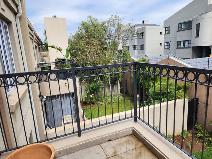 Spacious 2-bedroom apartment with garage, balcony, pool, and 24-hour security in Hyde Park.