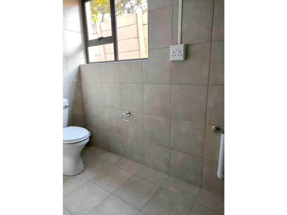 bathroom with shower and basin