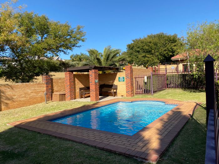 2-Bedroom Apartment To Rent in Honeydew Grove with pool, braai, and fiber.