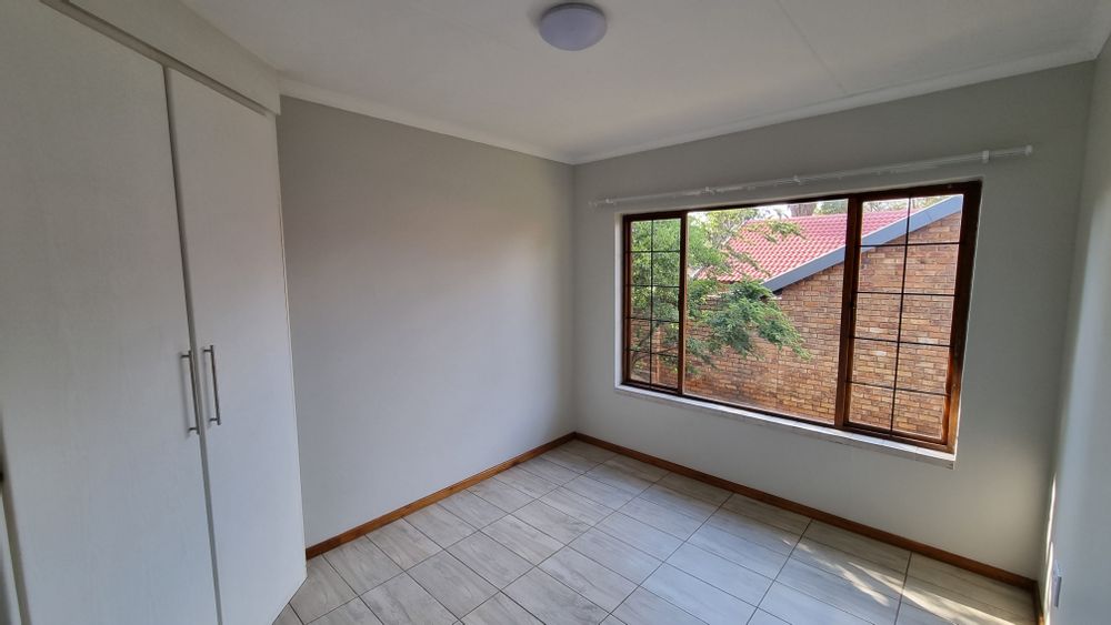 Second bedroom with built in cupboards