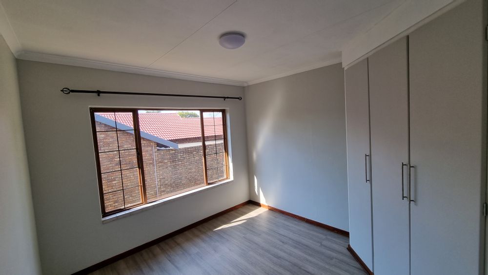 First bedroom with built in cupboards