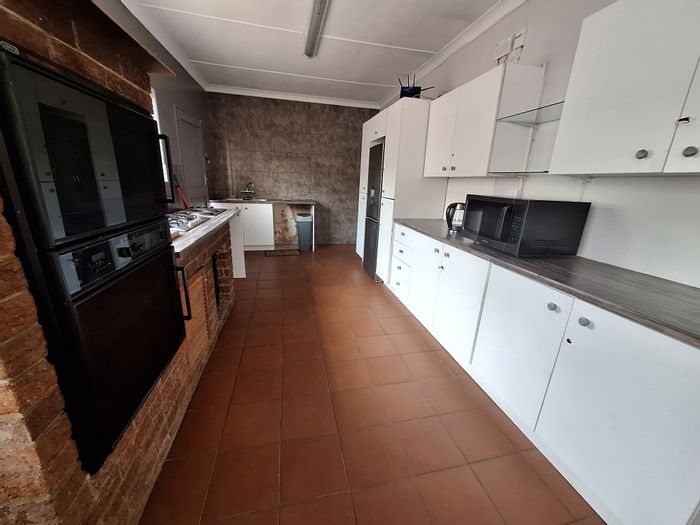 Furnished room for rent in Edenvale Central, shared kitchen and utilities included.