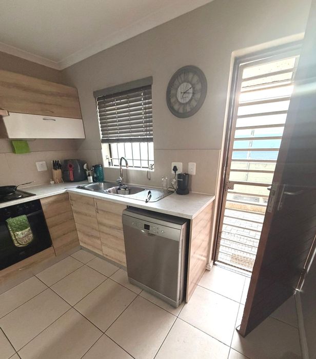 2-Bedroom Townhouse To Rent in Brackenfell South with secure complex and pet-friendly yard.