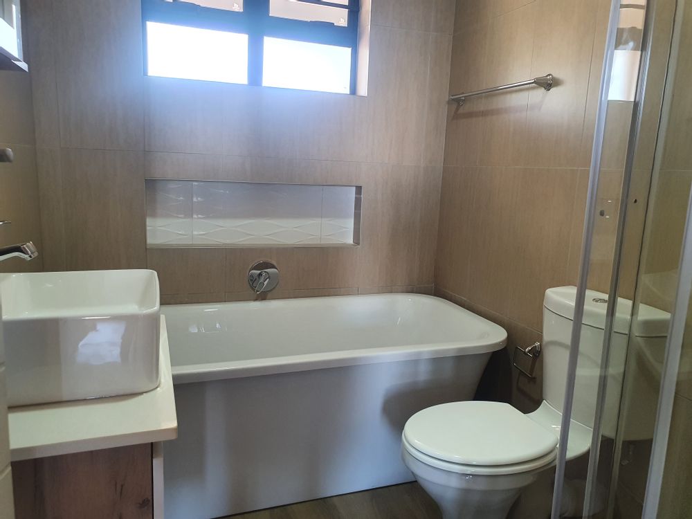 Bathroom with both a shower and bath.