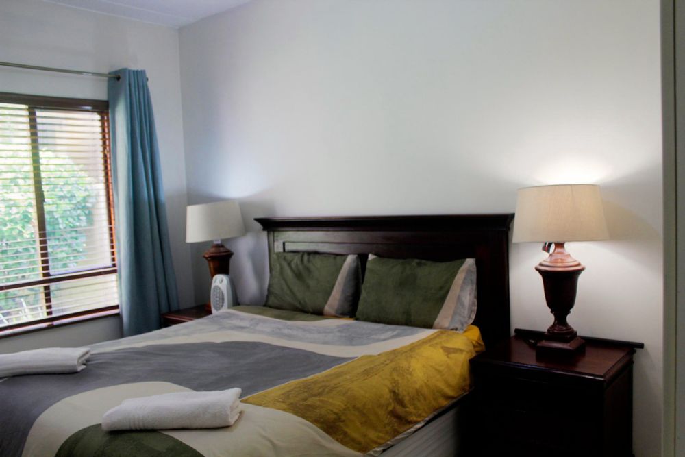 Master Bedroom - Comfortable bedroom with a cozy bed, fresh linen, and natural light.